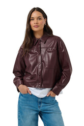 Kaffe women's dark burgundy faux leather long-sleeve blouse with collar, snap placket, and chest pocket shown from the front
