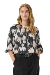 Part Two women's dark teal abstract floral long-sleeve blouse with keyhole neckline and gathered yoke shown from the front