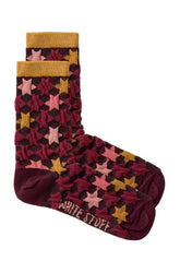 Women's burgundy star-pattern socks with mustard cuffs, isolated product view by White Stuff