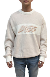 Chandail col rond en tricot ajouré écru vu de face avec motif beige à la poitrine pour homme par HUGO BOSS