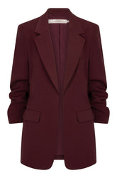 Esqualo women's burgundy blazer with notched lapels, flap pockets and ruched sleeves shown from the front