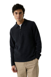 Men's front angled view of very dark navy textured knit long-sleeve knit sweater with polo collar and zipper by Garcia