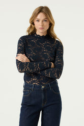 Women's navy floral lace long sleeve blouse on model, front waist-up view with scalloped mock neck by Garcia