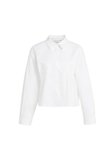 Blouse blanche à manches longues, vue de face avec col pointu et poignets larges pour femme par YAYA