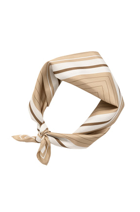 Women's beige square scarf tied in a loop, showing brown and ivory stripes and narrow stitched edges, product view by YAYA
