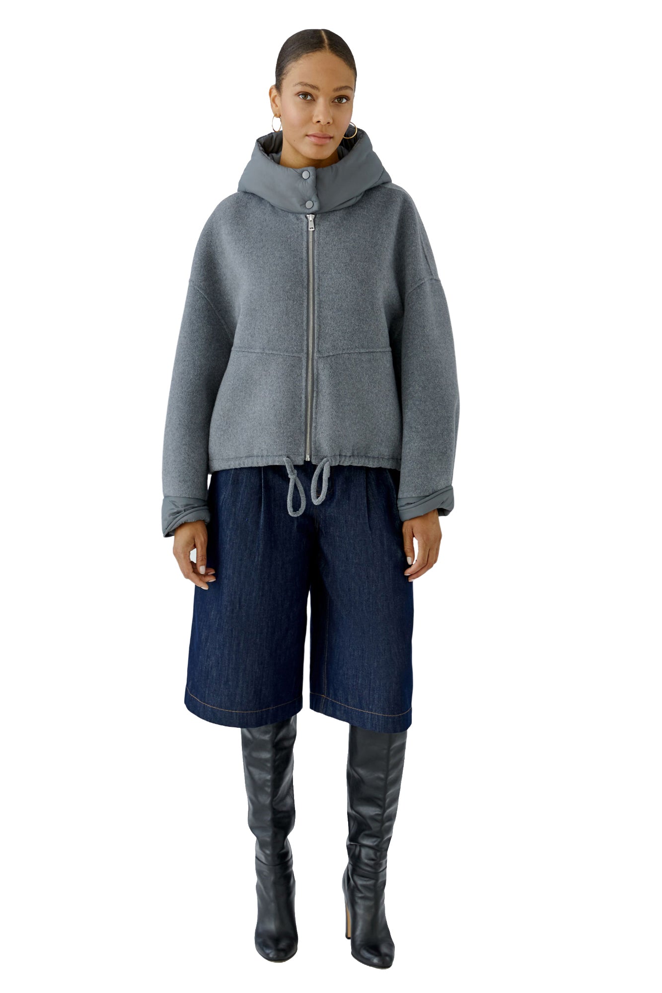 Women's full front model view of gray hooded zip jacket with drawstring hem and padded cuffs by Oui