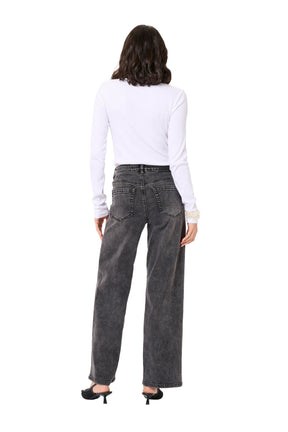 Back model view of women's washed black wide-leg jeans with rear patch pockets and faded seams by Kaffe
