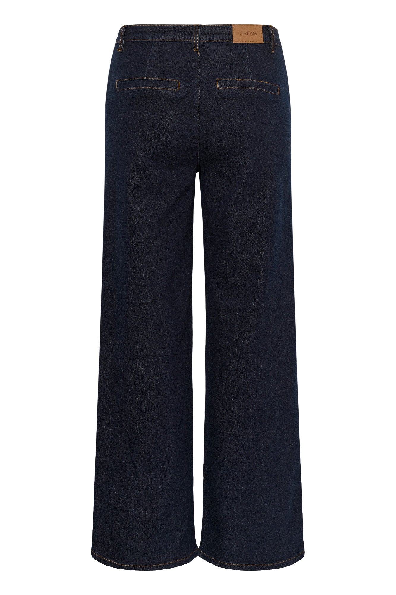 Vue arrière isolée d’une jean à jambe large large indigo foncé avec poches passepoilées et écusson CREAM pour femme