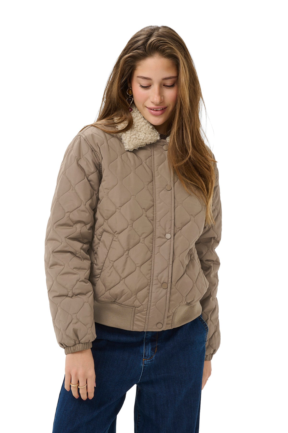 Women's taupe quilted windbreaker jacket with cream plush collar and ribbed hem, front view