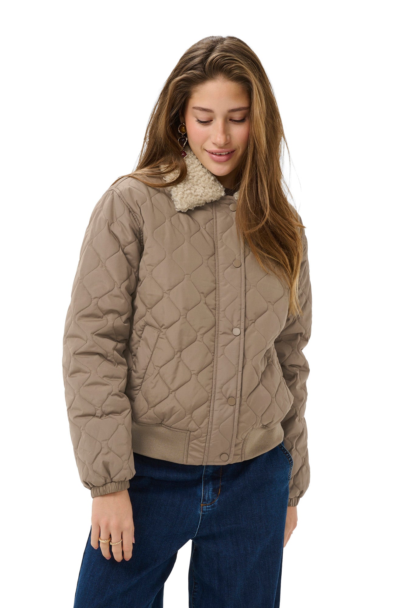 Women's taupe quilted windbreaker jacket with cream plush collar and ribbed hem, front view