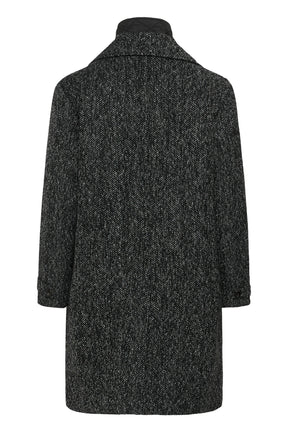 Cream women's black and white herringbone long coat with button-tab cuffs and straight hem shown from the back
