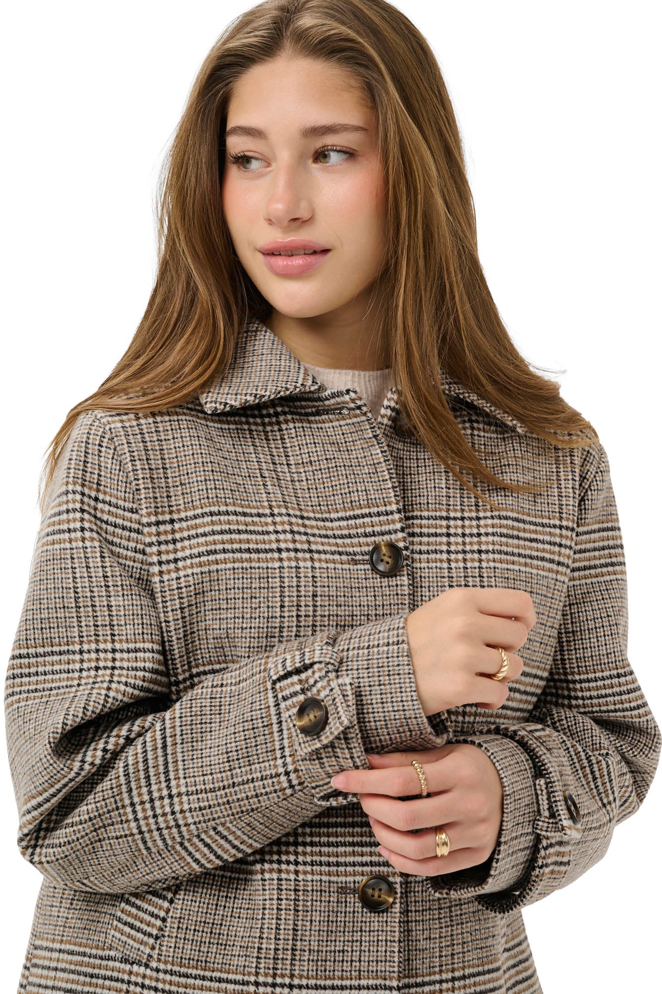 Cream women's close model view of beige plaid jacket with foldover collar, dark buttons, and cuff tab