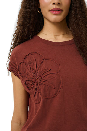 Women's close detail of rust knit Short-sleeve T-Shirt showing crewneck and ribbed sleeve cuff by Cream