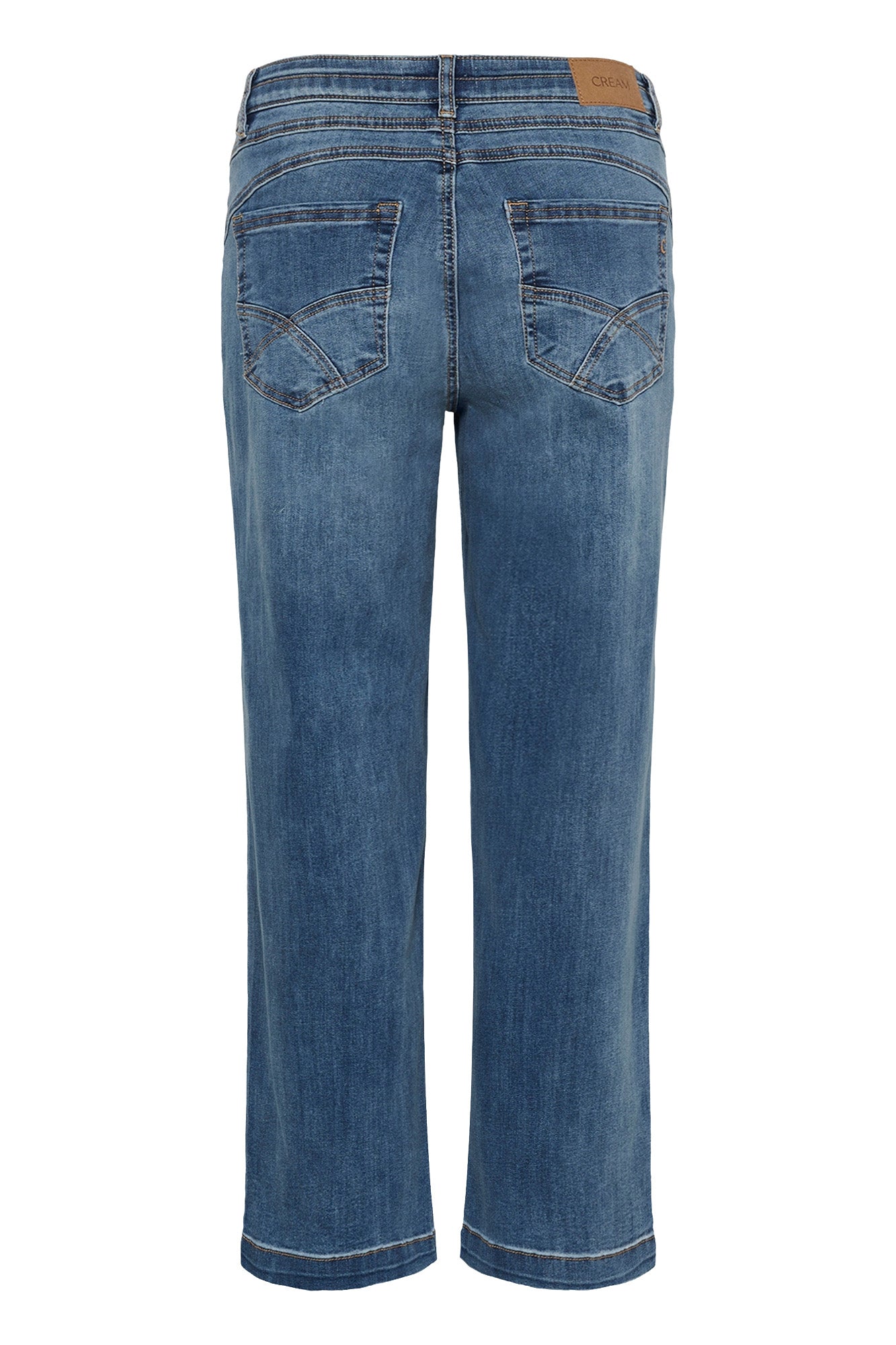 Vue arrière isolée du jean droit bleu moyen à jambe droite avec surpiqûres courbées aux poches pour femme par Cream