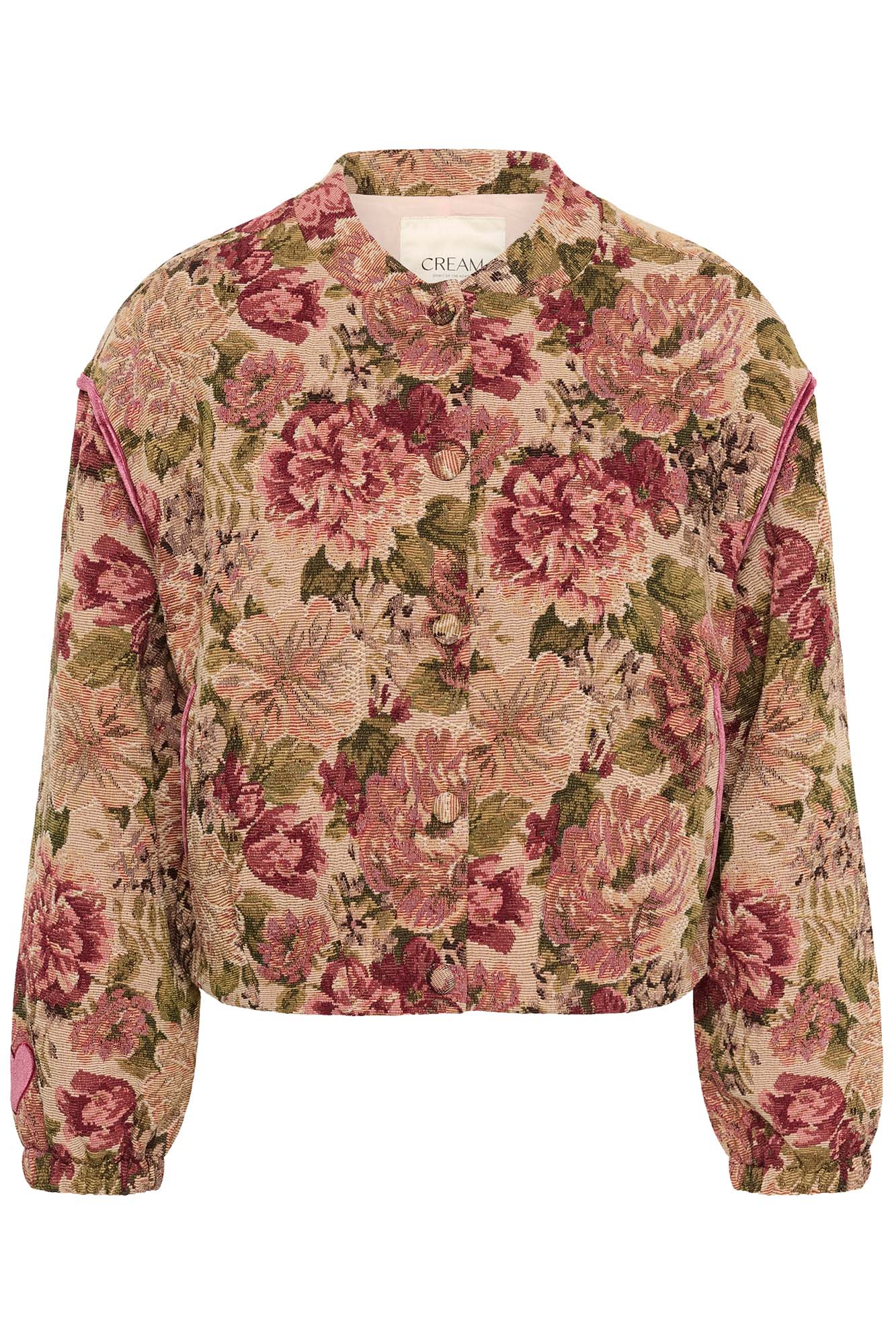Cream women's cropped beige floral jacket with buttons, pink piping, and pale lining, isolated front view