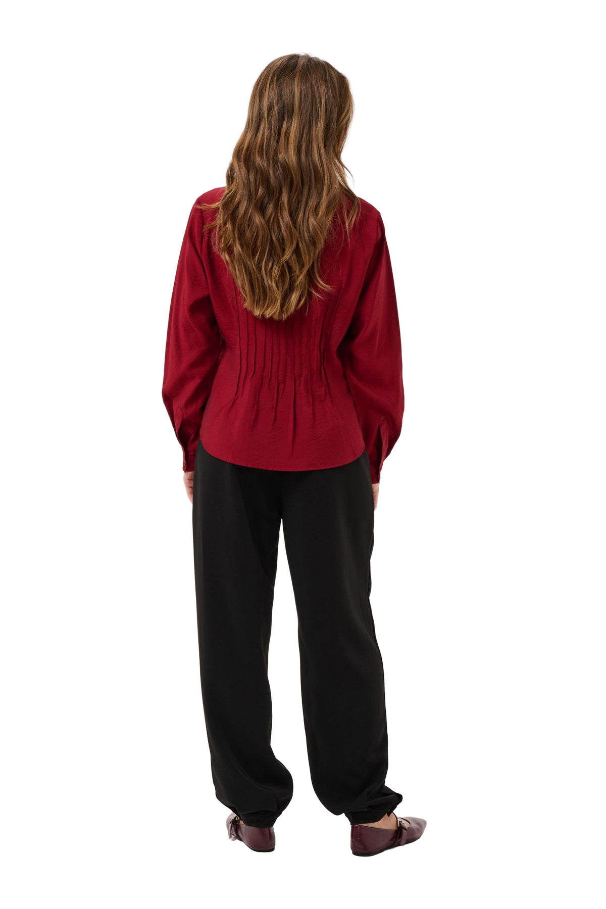 Cream women's burgundy long sleeve blouse with waist-shaping vertical pleats and curved hem shown from the back