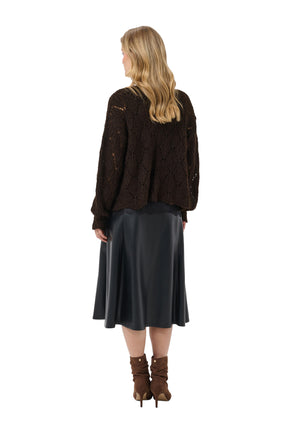 Cream women's dark brown pointelle knit cardigan with loose long sleeves, back model view