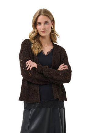 Cream women's close front model view of a dark brown open-knit cardigan with long sleeves and open front