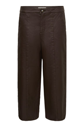Women's dark brown faux-leather straight-leg pants isolated front view with button waist, fly, pockets, and seams by Cream