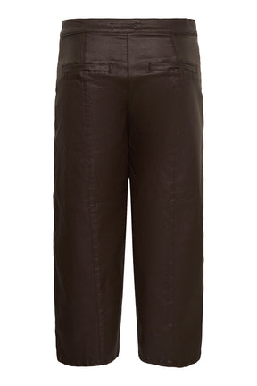 Cream women's dark brown faux-leather straight-leg pants isolated back view with welt pockets and vertical seam panels