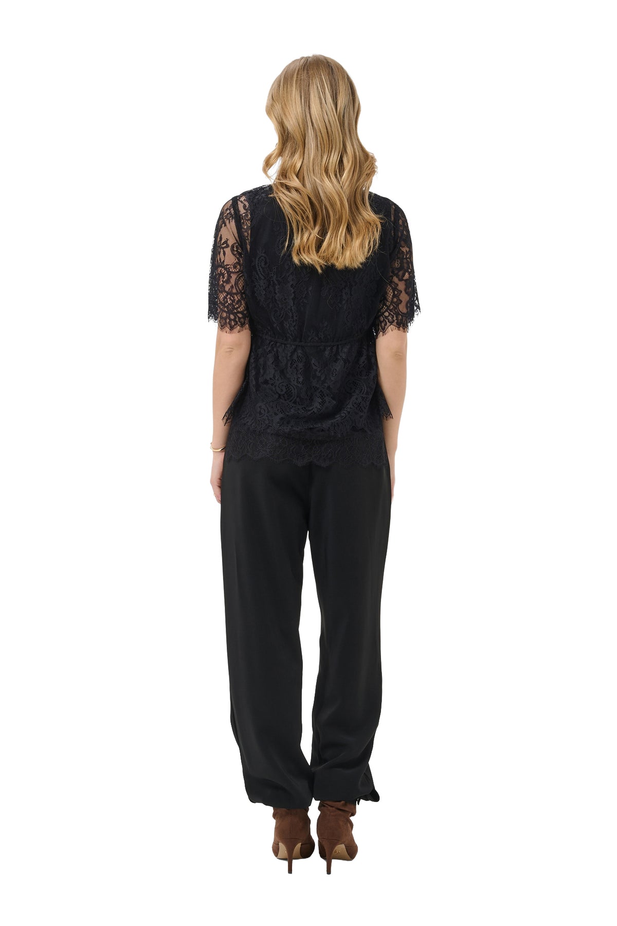 Women's black sheer lace short-sleeve blouse back view with, waist seam, and scalloped hem by Cream