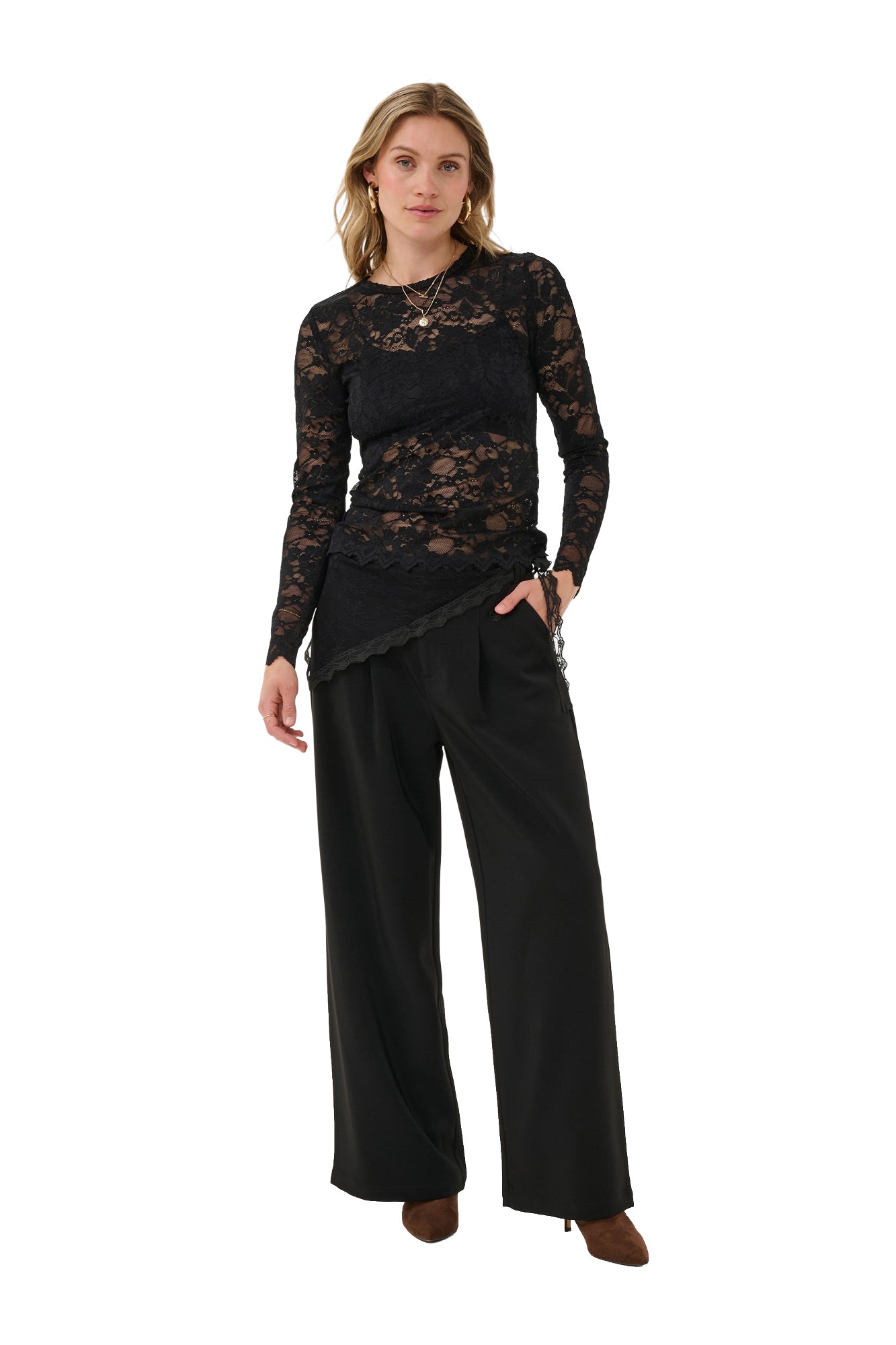 Cream women's full front model view of black floral lace long-sleeve blouse with round neck and long sheer sleeves