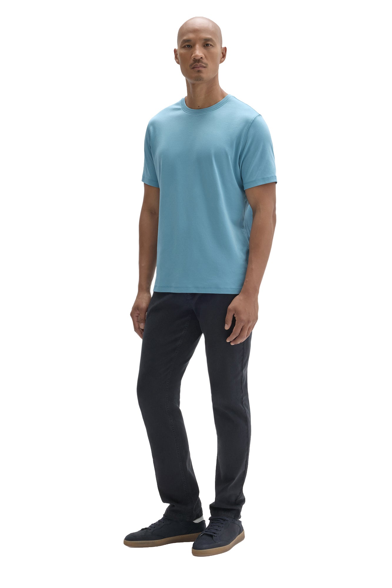 Men's angled full-body view of light blue crewneck Short-sleeve T-Shirt, side view by Robert Barakett