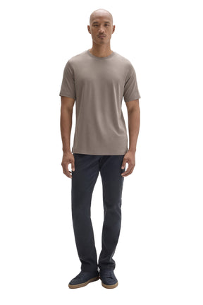 Men's full-body front view of taupe grey short sleeve crewneck T-Shirt styled with dark pants by Robert Barakett