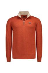 Men's rust orange half-zip sweatshirt with beige stand collar and small chest logo patch, product view by NZA