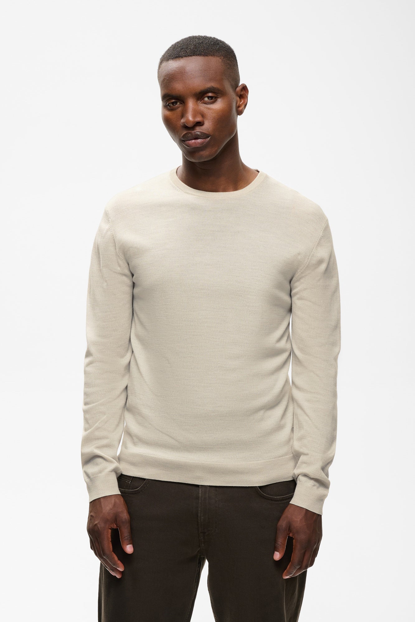 Matinique men's light beige crewneck knit long-sleeve knit sweater with ribbed hem shown from the front