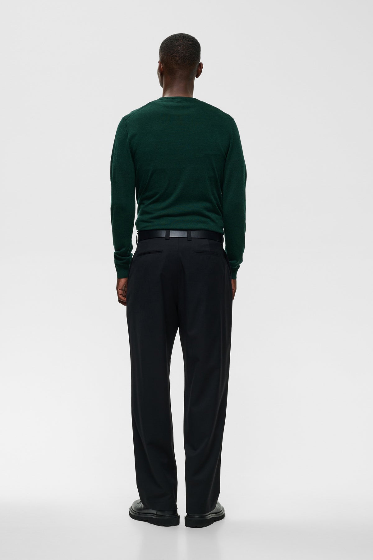 Matinique men's dark green long sleeve crewneck knit sweater with ribbed cuffs, back model view