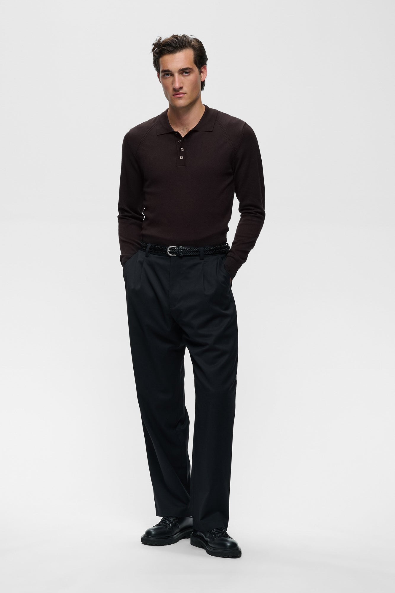 Men's full front view of a dark brown long sleeve polo with button placket and slim sleeves by Matinique