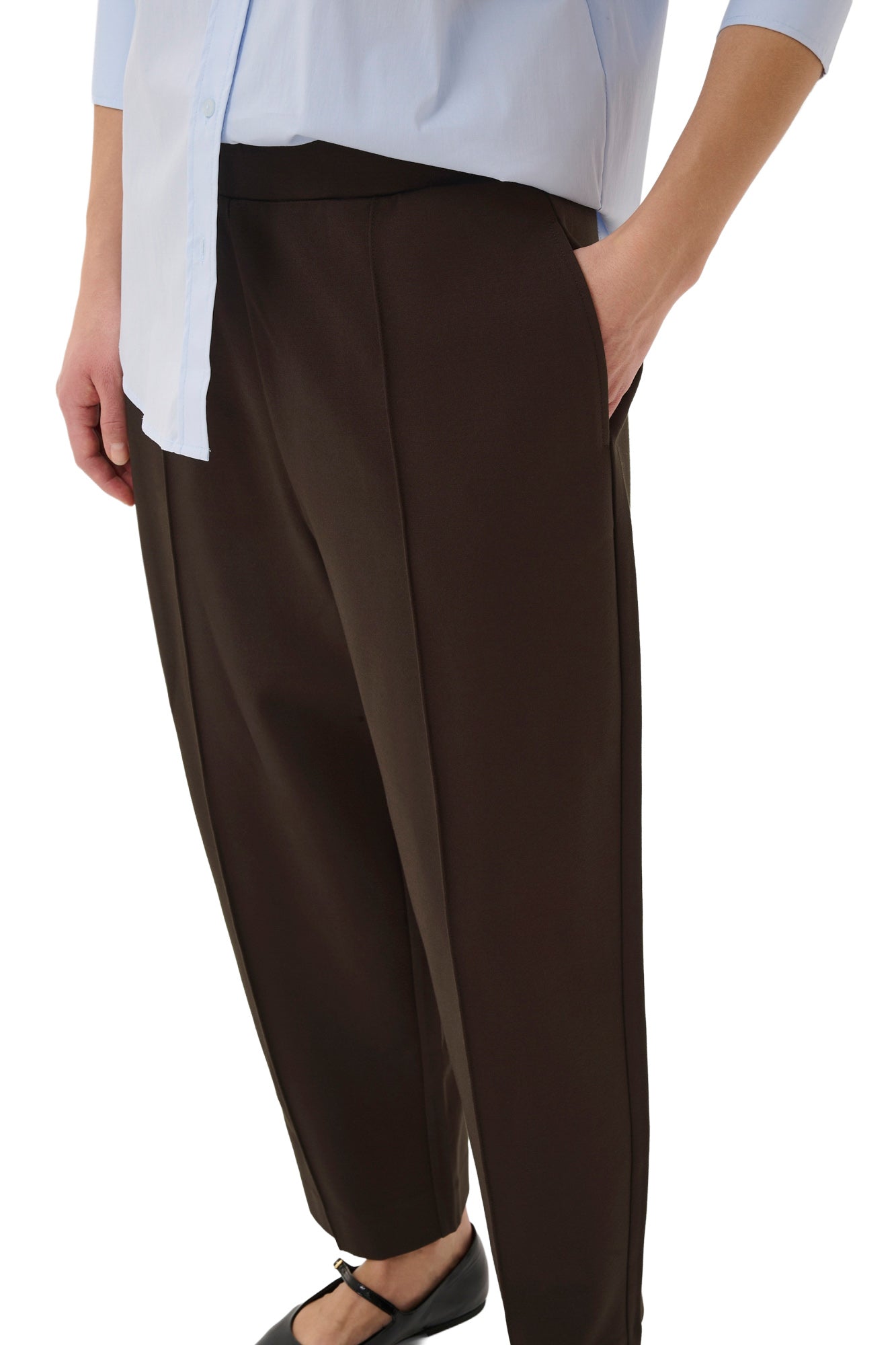 Part Two women's close side detail of dark brown pants showing the angled pocket and vertical leg seam