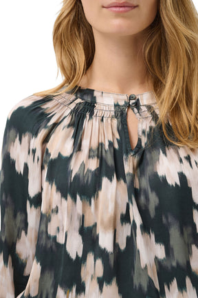 Part Two women's dark teal floral long-sleeve blouse collar with keyhole opening, buttons, and gathers, close-up