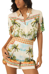 Short ivoire imprimé tropical, vue avant oblique avec taille orange et palmiers pour femme par Lez a Lez