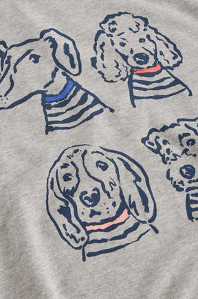 White Stuff women's gray sweatshirt fabric with navy dog drawings and coral and blue collar accents, close-up