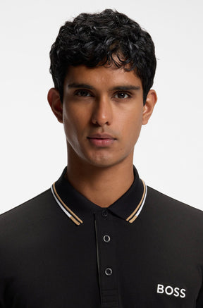 HUGO BOSS men's black short-sleeve polo collar with tan-white tipping, button placket, and BOSS logo, close-up