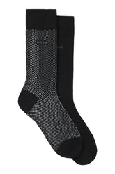Bas noirs, un avec motif à petits traits gris et logo BOSS, en vue produit isolée pour homme par HUGO BOSS