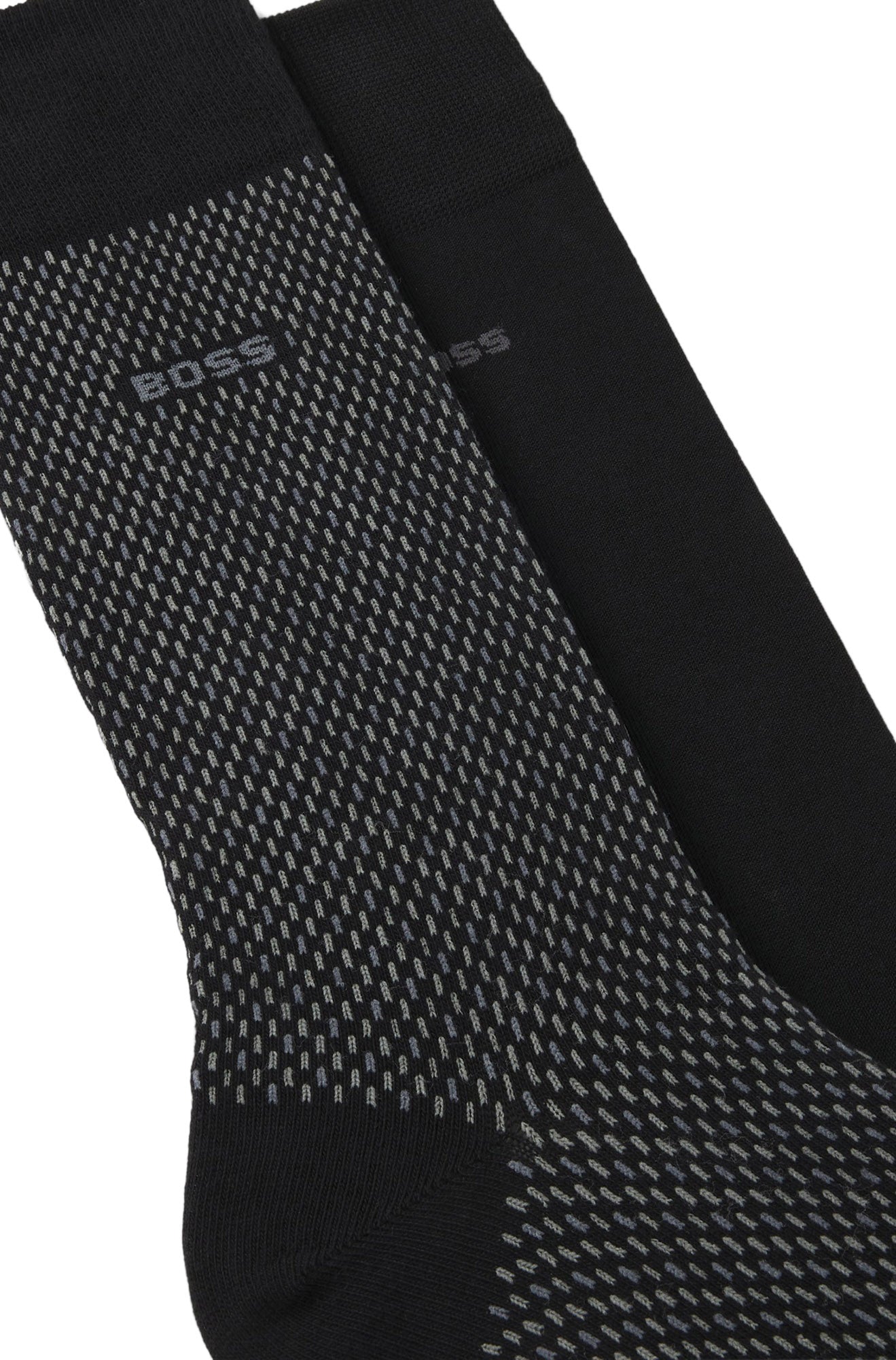 Bas noirs à petits traits gris, bord côtelé et logo BOSS pour homme par HUGO BOSS, en gros plan