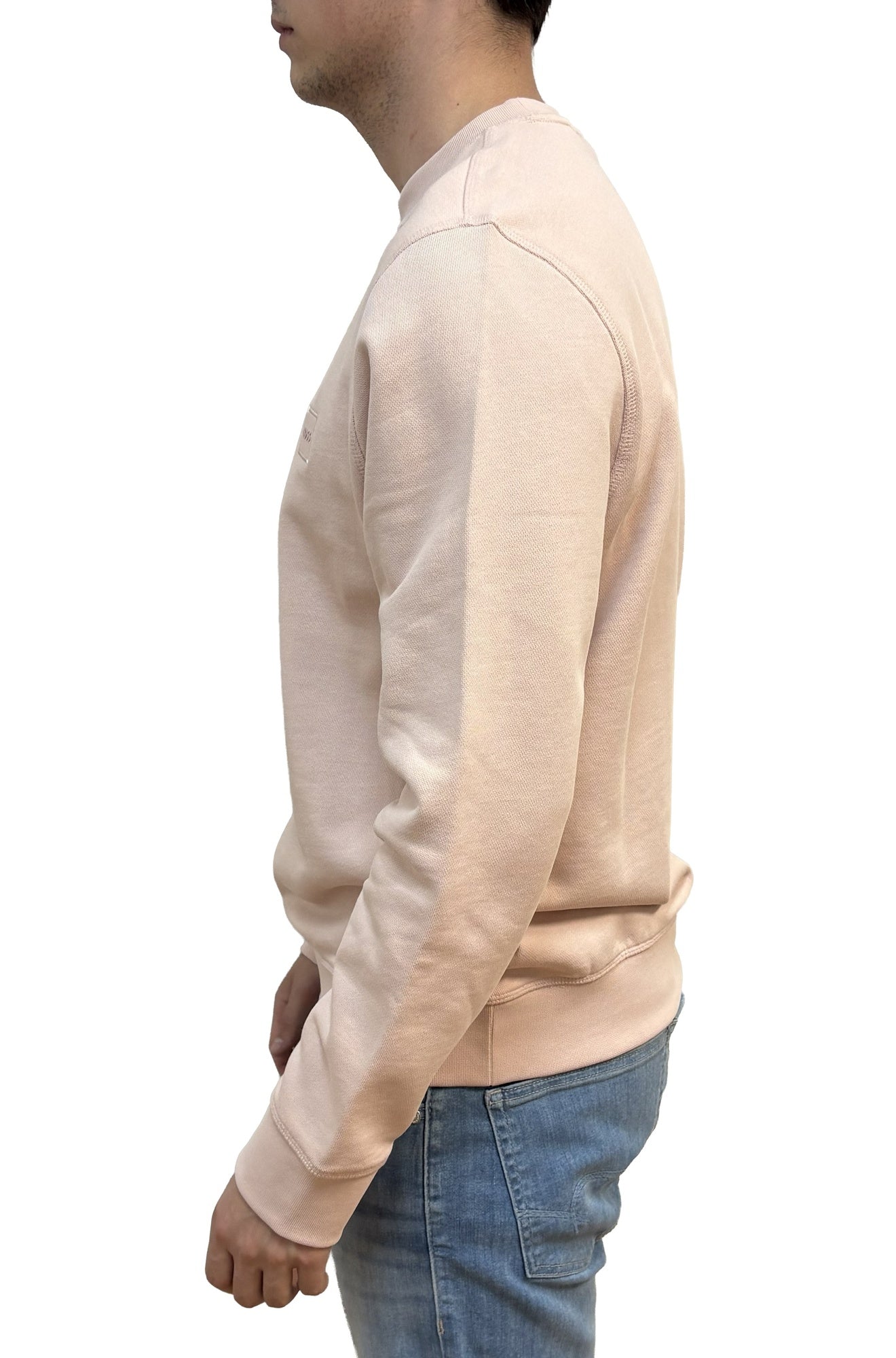Sweat-shirt rose pâle à col rond, avec poignets et ourlet côtelés pour homme par HUGO BOSS, vue de côté