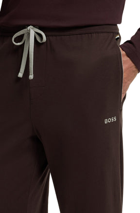 Détail du pantalon à cordon jogger brun foncé avec cordon gris et poche latérale pour homme par HUGO BOSS