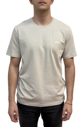 T-shirt beige pâle à col rond, manches courtes et logo BOSS blanc pour homme par HUGO BOSS, vue de face