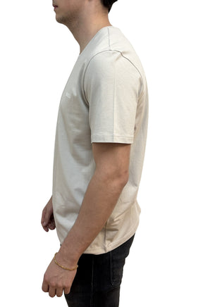 T-shirt beige pâle à col rond, manche courte et petit logo poitrine pour homme par HUGO BOSS, vue de côté