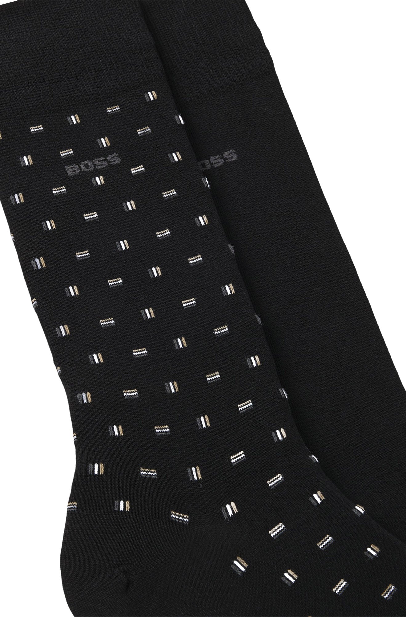 HUGO BOSS men's black dress socks showing small dash pattern, solid sock, knit texture, and gray BOSS logo, close-up