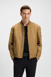 Coupe-vent mi-saison pour homme par HUGO BOSS | 50544097 Beige Moyen | Boutique Vvög, vêtements mode pour homme et femme