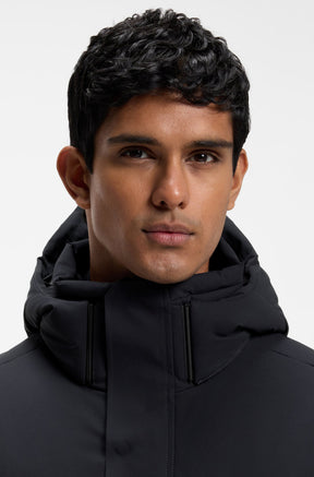 HUGO BOSS men's dark navy winter jacket hood, high collar, and covered front zipper, close view