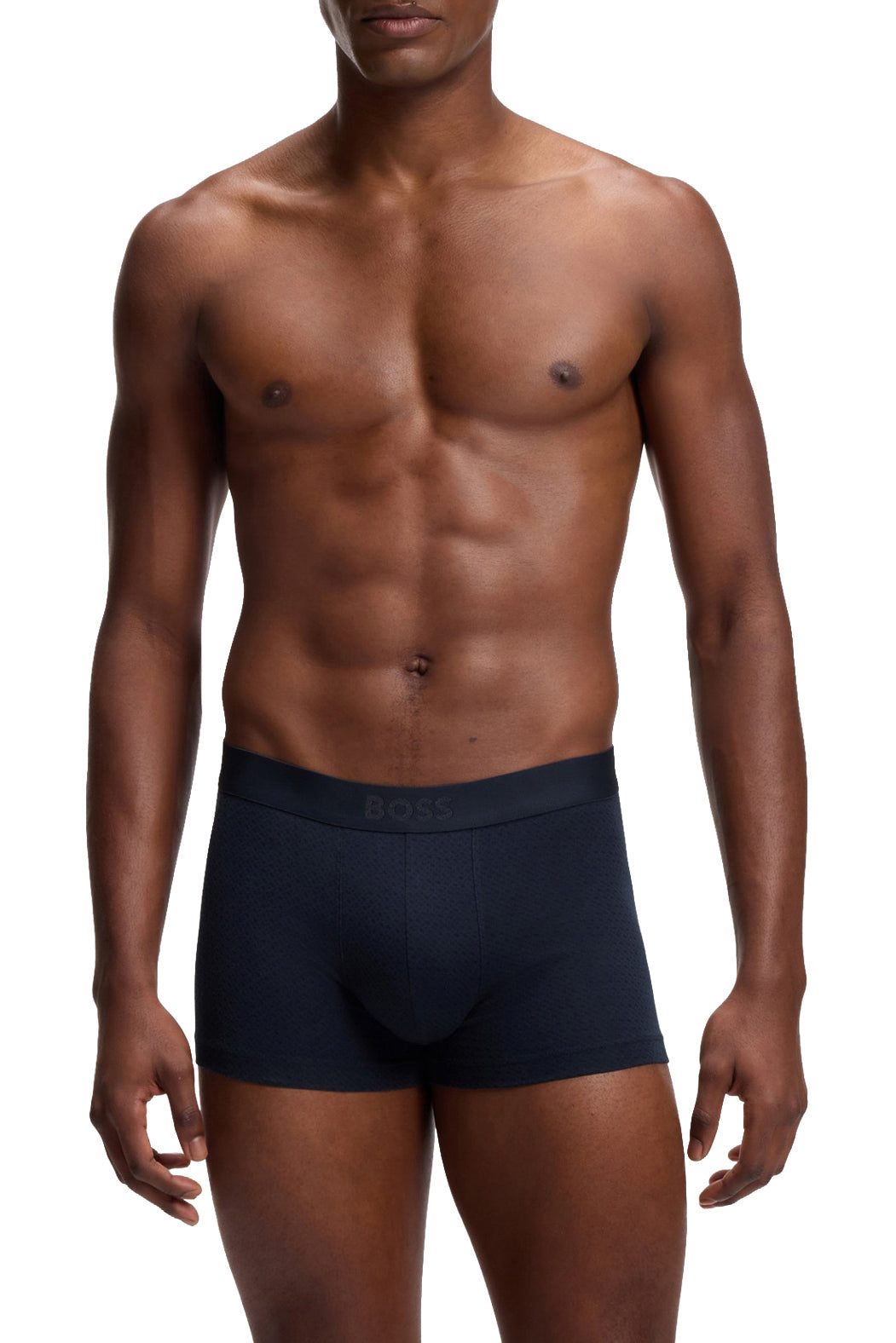 Sous-vêtement marine texturé avec taille à logo et jambes courtes pour homme par HUGO BOSS, vue avant sur mannequin