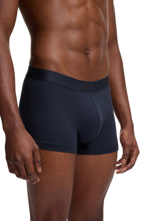Vue avant en angle d’un sous-vêtement marine avec poche profilée et logo ton sur ton à la taille pour homme par HUGO BOSS
