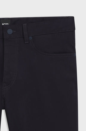 HUGO BOSS men's black jeans front waistband with button closure, belt loops, rivets, and pocket, close-up