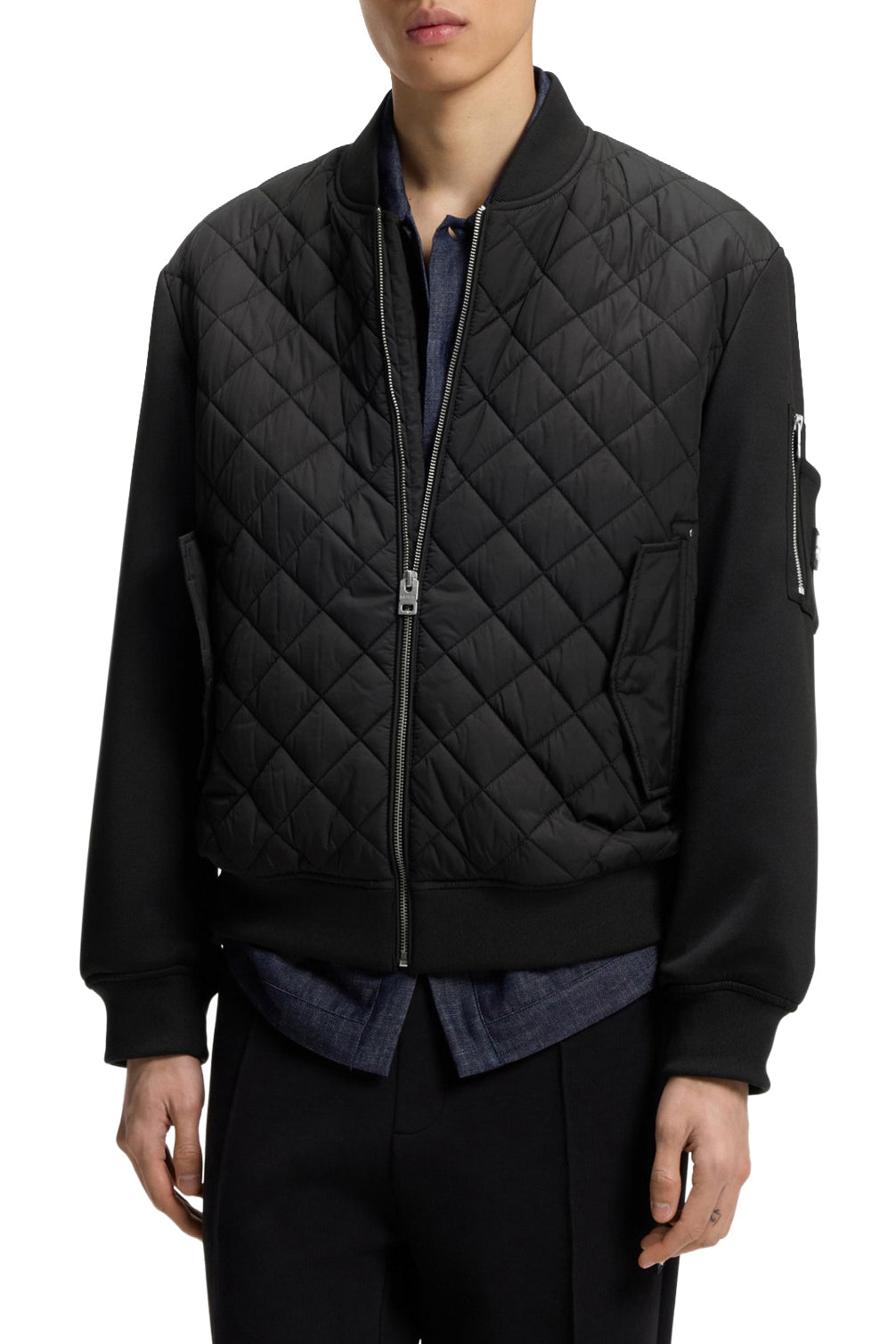 Veste noir matelassée avec fermeture éclair, ourlet et poignets côtelés pour homme par HUGO BOSS, vue avant